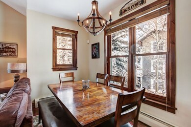 Dining room featuring a notable chandelier