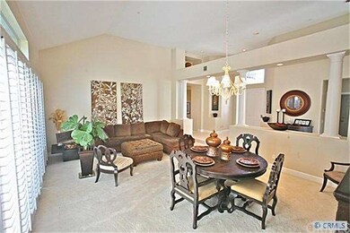 Looking back across the dining room toward the adj