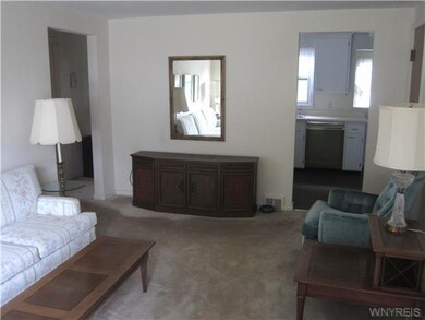 Living Room Beige carpeted Liv Rm (HW flrs) view s