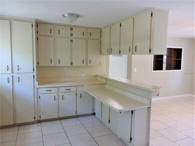 Plenty of storage in the eat in kitchen area