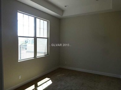 Den. Picture of model, not actual home. Front study/den