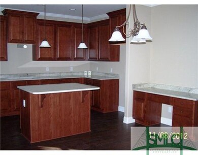 Kitchen. Notice the cabinet desk with matching gra