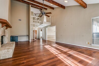 Unfurnished living room with visible vents, a ston