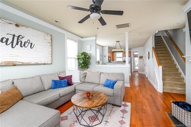 Open floor plan!  Hardwood floors on main, crown molding upon entry, living room & dining room.