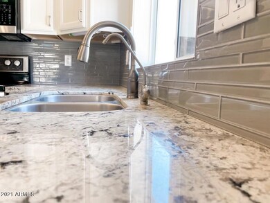 New Granite & Backsplash