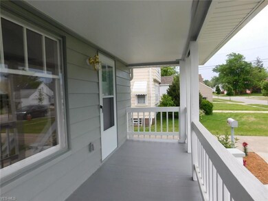 Large front porch welcomes your guests when they v