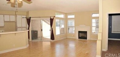 Living Room is open and bright, with lots of windo