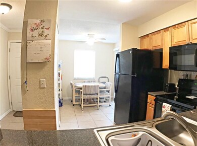 Kitchen with view of eat in dining area. All appli