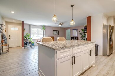 Kitchen island overlooks the large family room.