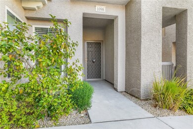 Doorway to property featuring stucco siding