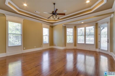 Huge master bedroom with trey ceiling, recessed li