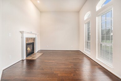 Warm and welcoming formal living room  featuring s
