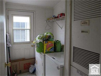 Inside laundry room (washer & dryer are included w