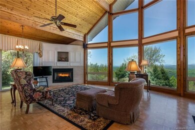 View from kitchen to living showing gas fireplace!