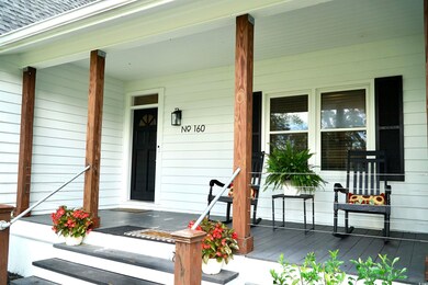 Property entrance with a porch