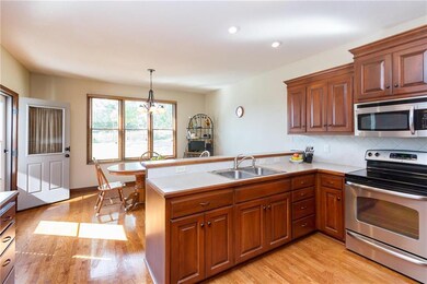 Birch cabinetry has rich mahogany stain.