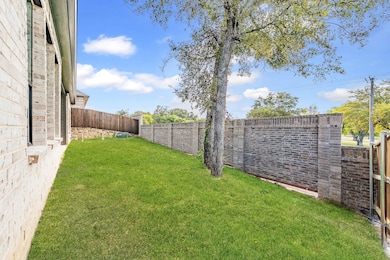 View of fenced backyard