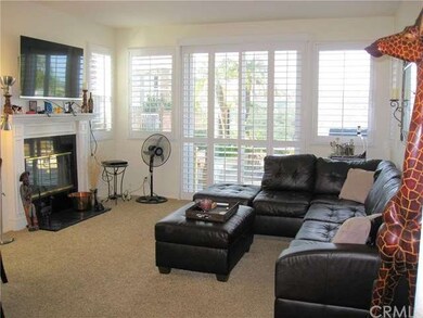 Living area with cozy gas log fireplace with black