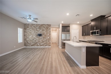 Kitchen with appliances with stainless steel finis
