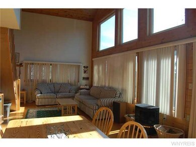Living Room. Propane gas fireplace adds warmth.