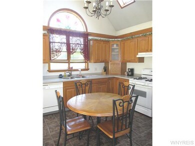 Kitchen. Palladium window to backyard.  Ample cabi