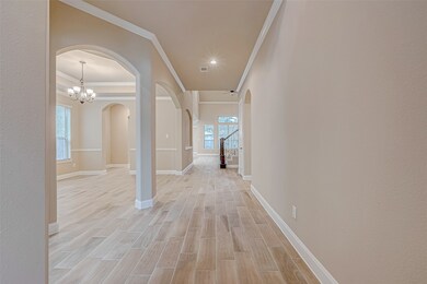 This photo showcases a spacious, well-lit hallway