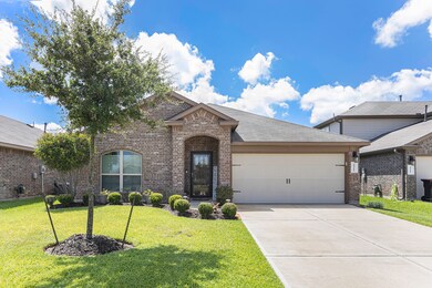 Wonderful curb appeal complete with established landscaping!