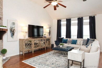 Great room with lighted ceiling fan