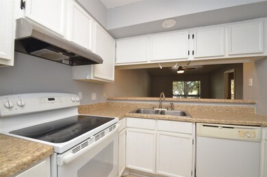 Spacious kitchen with appliances included.