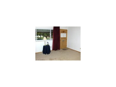 Another view of the living room displays the lovel