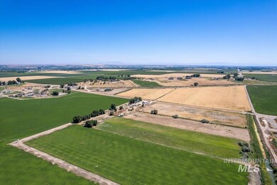 Aerial view of property and surrounding area with rural landscape