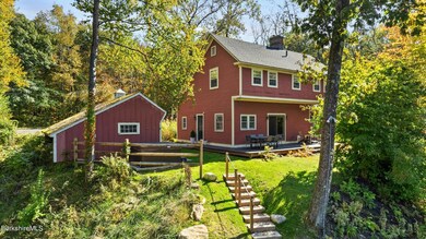 Rear of home with deck
