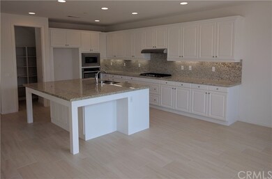 Bright, airy kitchen and dining space with white c