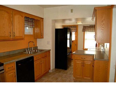 Kitchen. Laundry in rear of kitchen.