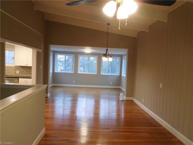 From front door looking into Living room, Dining room & main level Den / Sitting room w/tons of natural light.