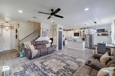 Living area featuring light wood finished floors,