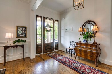 Wide front door and entry foyer. So much natural light!