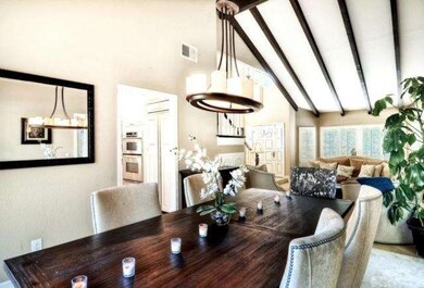 Formal dining room with high ceilings, travertine 