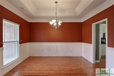 Formal Dining Room ~ Trey Ceiling ~ Wood Flooring 