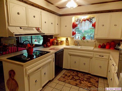 The kitchen is well laid out with plenty of work s