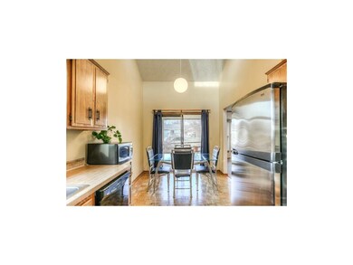 The vaulted ceiling enhances the size of the kitch