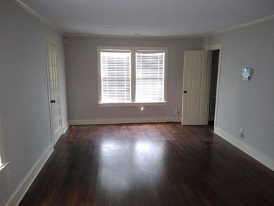 Unfurnished room featuring dark hardwood / wood-st