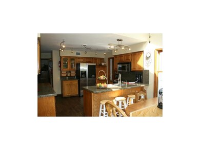 Hardwood floors, granite counters and stainless st