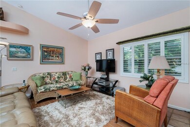 Plantation shutters at the front windows in the great room