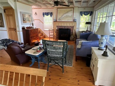 View of the living room facing the propane gas fir
