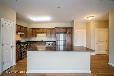 Kitchen featuring large island, stainless steel ap