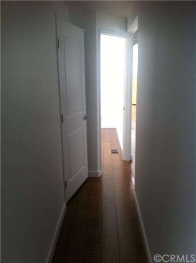 Hallway To Two Bedrooms, Laundry Room and Downstai