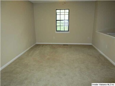 LIVING ROOM FEELS OPEN AND BRIGHT