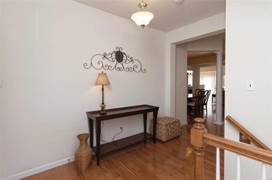 Entry  hardwood floors through outmost of main flo