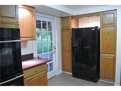 Kitchen. 2Pantries w/ pull-out shelves & built-ins